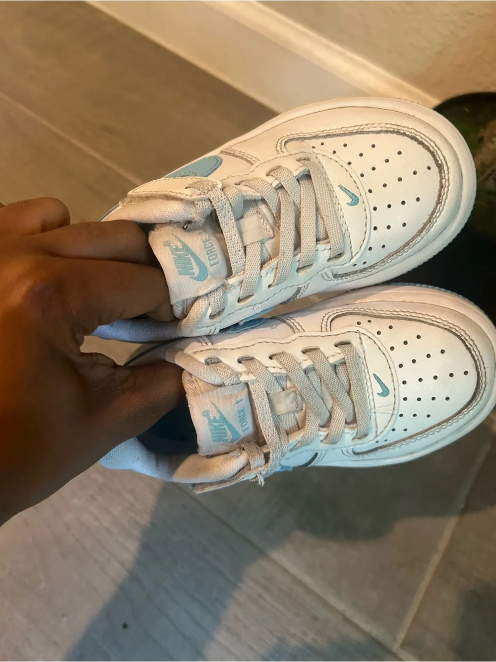 Nike Kids White Sneakers with Light Blue Accents